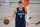 Dallas Mavericks forward Kristaps Porzingis (6) handles the ball against the Phoenix Suns during the first half of an NBA basketball game Sunday, Aug. 2, 2020, in Lake Buena Vista, Fla. (AP Photo/Ashley Landis, Pool)