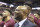 FILE - In this March 7, 2020, file photo, Florida State's head coach Leonard Hamilton celebrates with his team after their first ever ACC championship after an NCAA college basketball game against Boston College in Tallahassee, Fla. Hamilton was selected Associated Press Atlantic Coast Conference Coach of the Year Tuesday, March 10, 2020. (AP Photo/Steve Cannon, File)