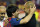 FC Barcelona's Lionel Messi from Argentina, left,  celebrates his victory with coach Josep Guardiola during the final Copa del Rey  soccer match against Athletic Bilbao at the Vicente Calderon stadium in Madrid, Spain, Friday, May 25, 2012. (AP Photo/Andres Kudacki)