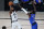 Dallas Mavericks' Tim Hardaway Jr. (11) covers Los Angeles Clippers' Paul George (13) during the first half of an NBA basketball first round playoff game Tuesday, Aug. 25, 2020, in Lake Buena Vista, Fla. (AP Photo/Ashley Landis, Pool)
