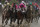 Flavien Prat on Country House, left, races against Luis Saez on Maximum Security, third from left, during the 145th running of the Kentucky Derby horse race at Churchill Downs Saturday, May 4, 2019, in Louisville, Ky. Maximum Security was disqualified and Country House won the race. (AP Photo/John Minchillo)
