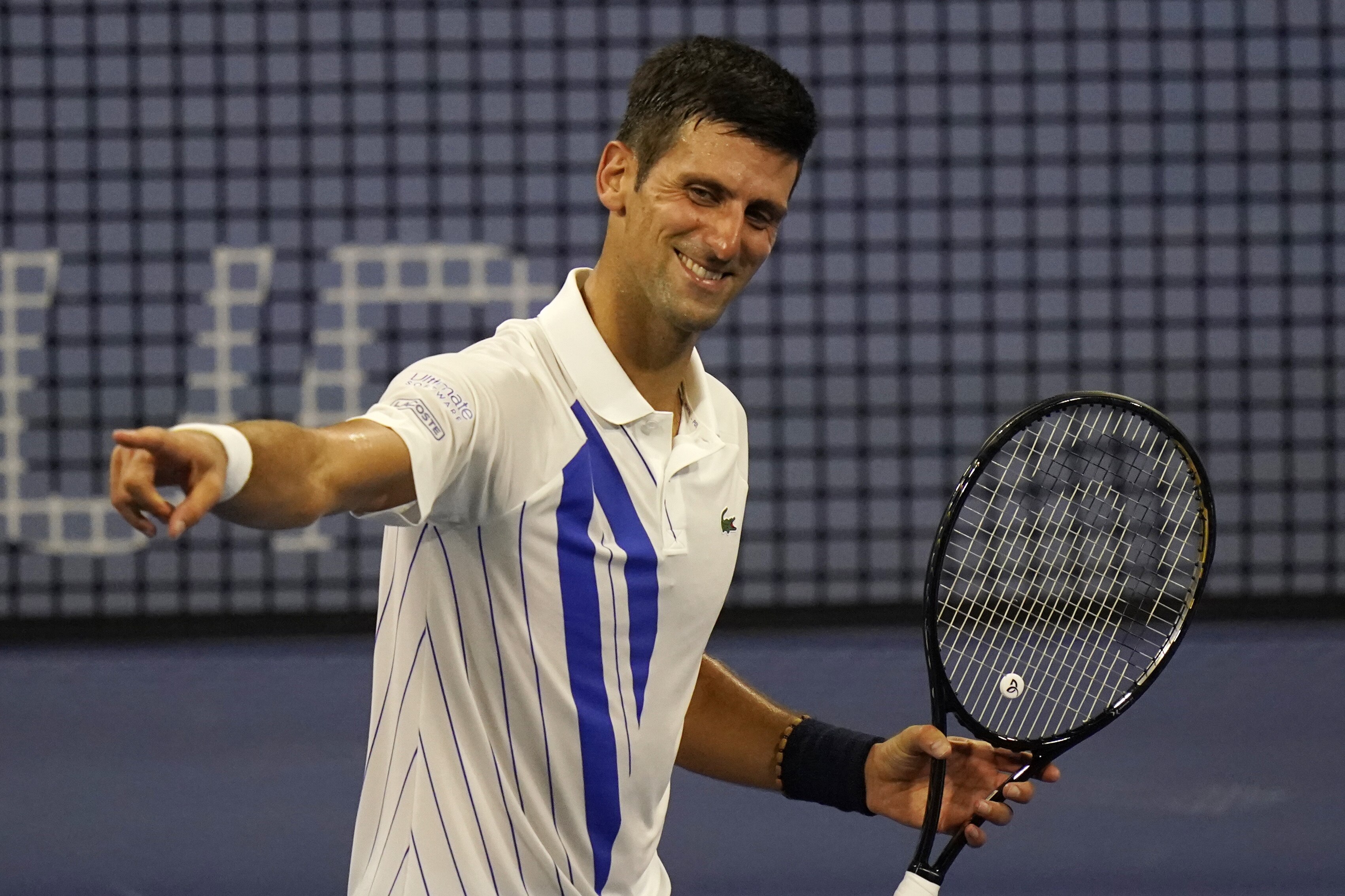Novak Djokovic, of Serbia, reacts to winning his match over Ricardas Berankis, of Lithuania, during the second round at the Western & Southern Open tennis tournament Monday, Aug. 24, 2020, in New York. (AP Photo/Frank Franklin II)