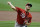 Cincinnati Reds' Trevor Bauer pitches during the first inning of a baseball game against the Milwaukee Brewers, Monday, Aug. 24, 2020, in Milwaukee. (AP Photo/Aaron Gash)