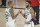 Boston Celtics forward Jayson Tatum (0) and center Daniel Theis (27) celebrate after Game 4 of an NBA basketball first-round playoff series against the Philadelphia 76ers, Sunday, Aug. 23, 2020, in Lake Buena Vista, Fla. (Kim Klement/Pool Photo via AP)
