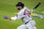 Boston Red Sox's Mitch Moreland singles to left field off Baltimore Orioles relief pitcher Dillon Tate during the fifth inning of a baseball game, Thursday, Aug. 20, 2020, in Baltimore. (AP Photo/Julio Cortez)