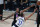 Los Angeles Clippers' Kawhi Leonard (2) fouls Dallas Mavericks' Luka Doncic (77) during the second half of an NBA first round playoff game Sunday, Aug. 30, 2020, in Lake Buena Vista, Fla. (AP Photo/Ashley Landis)
