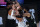 Dallas Mavericks' Luka Doncic (77) is fouled by Los Angeles Clippers' Marcus Morris Sr. during the first half of an NBA first round playoff game Sunday, Aug. 30, 2020, in Lake Buena Vista, Fla. (AP Photo/Ashley Landis)
