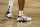 The shoes of Denver Nuggets' Jamal Murray are seen during the second  quarter of Game 5 of the team's NBA basketball first-round playoff series against the Utah Jazz, Tuesday, Aug. 25, 2020, in Lake Buena Vista, Fla. (Mike Ehrmann/Pool Photo via AP)