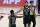 Boston Celtics' Kemba Walker (8) and Jayson Tatum (0) celebrate during the first half of an NBA basketball first round playoff game against the Philadelphia 76ers Monday, Aug. 17, 2020, in Lake Buena Vista, Fla. (AP Photo/Ashley Landis, Pool)