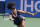 Naomi Osaka, of Japan, returns a shot from Elise Mertens, of Belgium, during the semifinals at the Western & Southern Open tennis tournament Friday, Aug. 28, 2020, in New York. (AP Photo/Frank Franklin II)