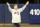 FILE - In this Sept. 28, 2008 file photo, Hall of Fame pitcher Tom Seaver acknowledges the fans' reception during a post-game ceremony honoring former Mets players after the Florida Marlins defeated the Mets 4-2 to end their playoff hopes in the final Major League Baseball game at Shea Stadium in New York. Seaver is slated to throw out the ceremonial first pitch to former catcher Mike Piazza when the Mets open their new ballpark Monday night, April 13, 2009, with a game against San Diego. (AP Photo/Kathy Willens, File)