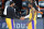 Los Angeles Lakers' Anthony Davis, left, shakes hands with LeBron James as James goes to the bench during the first half of an NBA basketball first round playoff game against the Portland Trail Blazers Saturday, Aug. 29, 2020, in Lake Buena Vista, Fla. (AP Photo/Ashley Landis)