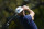 Dustin Johnson hits his tee shot on the fifth hole during the final round of the Tour Championship golf tournament at East Lake Golf Club in Atlanta, Monday, Sept. 7, 2020. (AP Photo/John Bazemore)