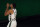 Milwaukee Bucks' Giannis Antetokounmpo (34) gestures upward before the start of the first half of an NBA basketball conference semifinal playoff game against the Miami Heat, Monday, Aug. 31, 2020, in Lake Buena Vista, Fla. (AP Photo/Mark J. Terrill)