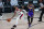 Portland Trail Blazers guard Damian Lillard (0) drives past Los Angeles Lakers guard Kentavious Caldwell-Pope (1) during the first half of an NBA basketball first round playoff game, Saturday, Aug. 22, 2020, in Lake Buena Vista, Fla. (AP Photo/Ashley Landis, Pool)