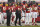 Kansas City Chiefs players stand during the national anthem before an NFL football game against the Houston Texans Thursday, Sept. 10, 2020, in Kansas City, Mo. (AP Photo/Jeff Roberson)