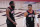 Houston Rockets' James Harden, left and Russell Westbrook walks together during the second half of an NBA conference semifinal playoff basketball game against the Los Angeles Lakers Saturday, Sept. 12, 2020, in Lake Buena Vista, Fla. (AP Photo/Mark J. Terrill)