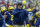 Michigan head coach Jim Harbaugh calls a timeout in the third quarter of an NCAA college football game against Ohio State in Ann Arbor, Mich., Saturday, Nov. 30, 2019. Ohio State won 56-27. (AP Photo/Tony Ding)