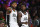 Los Angeles Clippers' Paul George (13) talks with Los Angeles Clippers' Patrick Beverley (21) during an NBA basketball game between Los Angeles Lakers and Los Angeles Clippers, Wednesday, Dec. 25, 2019, in Los Angeles. The Clippers won 111-106. (AP Photo/Ringo H.W. Chiu)