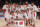 Wisconsin poses for a team picture after their championship victory over Oklahoma in the Battle 4 Atlantis basketball tournament in Paradise Island, Bahamas, Friday, Nov. 28, 2014. Wisconsin defeated Oklahoma 69-56. (AP Photo/Tim Aylen)