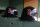 Boston Red Sox batting helmets are seen in the dugout before a baseball game against the Tampa Bay Rays in Boston, Thursday, July 25, 2013. (AP Photo/Michael Dwyer)