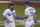 Los Angeles Dodgers' Justin Turner, left, celebrates with Joc Pederson after scoring due to a single by Will Smith during the first inning of a baseball game against the Los Angeles Angels, Saturday, Sept. 26, 2020, in Los Angeles. (AP Photo/Ashley Landis)