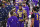 Los Angeles Lakers' LeBron James (23) talks with players as confetti falls after the Lakers beat the Denver Nuggets in an NBA conference final playoff basketball game Saturday, Sept. 26, 2020, in Lake Buena Vista, Fla. The Lakers won 117-107 to win the series 4-1. (AP Photo/Mark J. Terrill)