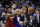 Philadelphia 76ers' Ben Simmons, right, and Miami Heat's Jimmy Butler reach for a pass during the second half of an NBA basketball game, Wednesday, Dec. 18, 2019, in Philadelphia. (AP Photo/Matt Slocum)