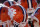 Clemson players lift their helmets into the air as they huddle before an NCAA college football game against Maryland in College Park, Md., Saturday, Oct. 26, 2013. (AP Photo/Patrick Semansky)