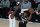 Sacramento Kings' Buddy Hield (24) passes around the defense of Houston Rockets' Danuel House Jr. (4), left, during the first half of an NBA basketball game Sunday, Aug. 9, 2020, in Lake Buena Vista, Fla. (AP Photo/Ashley Landis, Pool)