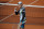 Italy's Jannik Sinner clenches his fist after scoring a point against Germany's Alexander Zverev in the fourth round match of the French Open tennis tournament at the Roland Garros stadium in Paris, France, Sunday, Oct. 4, 2020. (AP Photo/Christophe Ena)