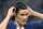 FILE - In this Feb. 29, 2020 file photo, PSG's Edinson Cavani adjust his headband during the French League One soccer match between Paris-Saint-Germain and Dijon, at the Parc des Princes stadium in Paris, France. Manchester United bolstered its attacking options by signing free agent Edinson Cavani before the extended summer transfer window closed on Monday, Oct. 5, 2020. The 33-year-old striker scored 200 goals in 301 games during seven years at Paris Saint-Germain but he left at the end of his contract in June. (AP Photo/Michel Euler, File)
