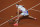 Petra Kvitova of the Czech Republic plays a shot against Germany's Laura Siegemund in the quarterfinal match of the French Open tennis tournament at the Roland Garros stadium in Paris, France, Wednesday, Oct. 7, 2020. (AP Photo/Christophe Ena)