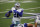 Dallas Cowboys running back Ezekiel Elliott (21) runs the ball against the New York Giants in the second half of an NFL football game in Arlington, Texas, Sunday, Oct. 11, 2020. (AP Photo/Michael Ainsworth)