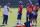 From left, Denver Broncos running backs coach Curtis Modkins confers. with running back Melvin Gordon as, from back to front right, running backs Royce Freeman, LeVante Bellamy and Phillip Lindsay listen in during NFL football practice Thursday, Sept. 3, 2020, in Englewood, Colo. (AP Photo/David Zalubowski)