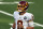 Washington Football Team quarterback Kyle Allen (8) runs off the field during an NFL football game against the New York Giants, Sunday, Oct. 18, 2020, in East Rutherford, N.J. (AP Photo/Adam Hunger)
