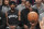 FILE - In this Nov. 1, 2019, file photo, Brooklyn Nets' Kyrie Irving, left, and Kevin Durant watch the game action from the bench during the second half of an NBA basketball game against the Houston Rockets in New York. With so much uncertainty around the NBA season, Brooklyn Nets general manager Sean Marks is no longer ruling Kevin Durant out for the season. Marks had repeatedly said he didn't expect Durant to play this season while recovering from Achilles tendon surgery, but he acknowledged Wednesday that everything is unknown now that the season is suspended because of the new coronavirus. Even Kyrie Irving, who had shoulder surgery on March 3, might be available if play stretched into the summer. (AP Photo/Mary Altaffer, File)