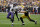 Baltimore Ravens quarterback Lamar Jackson (8) scrambles away from Pittsburgh Steelers outside linebacker T.J. Watt (90) in the first half of an NFL football game, Sunday, Oct. 6, 2019, in Pittsburgh. (AP Photo/Gene J. Puskar)