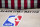 Black Lives Matter is displayed near the NBA logo in an empty basketball arena Friday, Aug. 28, 2020, in Lake Buena Vista, Fla.  The NBA playoffs will resume Saturday after the league and the National Basketball Players Association detailed the commitments that made players comfortable continuing the postseason. In a joint statement released Friday, the sides say they will immediately establish a social justice coalition, made up of players, coaches and owners, that would focus on issues such as voting access and advocating for meaningful police and criminal justice reform. (AP Photo/Ashley Landis, Pool)