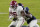 Alabama wide receiver DeVonta Smith (6) is tackled by a Mississippi defender shortly after catching a pass during the second half of an NCAA college football game in Oxford, Miss., Saturday, Oct. 10, 2020. Alabama won 63-48. (AP Photo/Rogelio V. Solis)