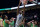 Memphis center James Wiseman (32) dunks against Oregon during the second half of an NCAA college basketball game in Portland, Ore., Tuesday, Nov. 12, 2019. Oregon won 82-74. (AP Photo/Craig Mitchelldyer)