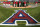 The Los Angeles Angels logo is seen  behind home plate during the Angels baseball practice in Anaheim, Calif., Wednesday, Oct. 21, 2009. The Angels play the New York Yankees in Game 5 of the American League Championship Series on Thursday. (AP Photo/Jae C. Hong)