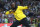 Jamaica's Usain Bolt makes his trademark gesture during a lap of honor at the end of the World Athletics Championships in London Sunday, Aug. 13, 2017. (AP Photo/Matt Dunham)