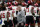 FILE - In this Dec. 31, 2019, file photo, Utah head coach Kyle Whittingham, center, watches over his team as they prepare for the Alamo Bowl NCAA college football game against Texas in San Antonio. The season opener scheduled for Saturday between Utah and Arizona in Salt Lake City was canceled following a request from the Utes due to what the Pac-12 said were a number of COVID-19 cases among Utah players. (AP Photo/Eric Gay, File)