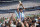 **  FILE  ** Argentina's Diego Maradona, holding up the trophy, is carried on shoulders as he celebrates at the end of the World Cup soccer final game against West Germany at the Atzeca Stadium, in Mexico City, in this June 29, 1986, file photo. Argentina won 3-2. Maradona and Argentinean coach Carlos Bilardo have been asked to lead Argentina by Julio Grondona, head of the Argentine Football Association, Tuesday, Oct. 28, 2008. (AP Photo/Carlo Fumagalli, file)