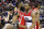 Houston Rockets guard James Harden, center left, and Washington Wizards guard John Wall (2) talk after an NBA basketball game Sunday, March 29, 2015, in Washington. The Rockets won 99-91. (AP Photo/Alex Brandon)
