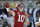 FILE- In this Jan. 1, 2020, file photo, Alabama quarterback Mac Jones (10) throws a pass during the second half of the Citrus Bowl NCAA college football game against Michigan in Orlando, Fla. Alabama quarterback Mac Jones and Auburn's Bo Nix have taken different paths to their starting jobs. Now, they'll lead their teams into the Iron Bowl for the second straight year. (AP Photo/John Raoux, File)