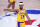 Los Angeles Lakers' Quinn Cook gestures from the court during the second half an NBA conference final playoff basketball game against the Denver Nuggets on Friday, Sept. 18, 2020, in Lake Buena Vista, Fla. (AP Photo/Mark J. Terrill)