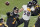 Pittsburgh Steelers quarterback Ben Roethlisberger (7) throws a touchdown pass to wide receiver JuJu Smith-Schuster as Baltimore Ravens outside linebacker L.J. Fort (58) pressures him during the second half of an NFL football game Wednesday, Dec. 2, 2020, in Pittsburgh. (AP Photo/Gene J. Puskar)