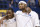 Kentucky freshmen, from left to right, Eric Bledsoe, John Wall and DeMarcus Cousins watch senior day activities prior to their NCAA college basketball game against Florida in Lexington, Ky., Sunday, March 7, 2010. (AP Photo/Ed Reinke)